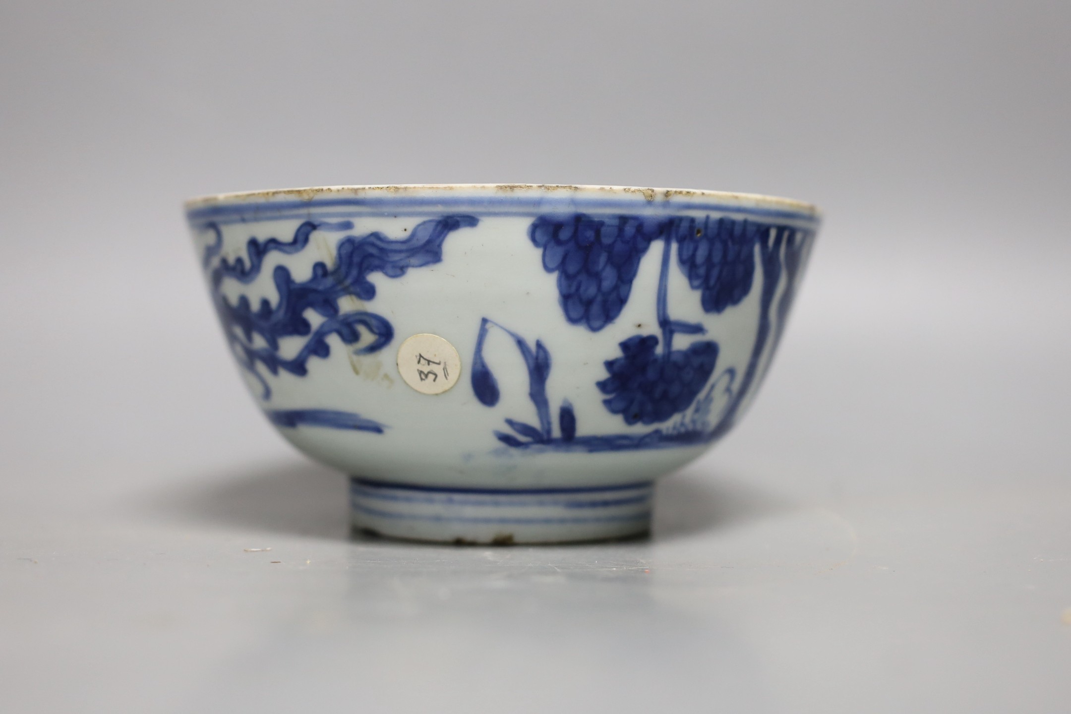 A Chinese blue and white ‘phoenix’ deep bowl, 17th century, 15.5cm